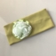 Opaska zielona z kwiatkiem - OPS798