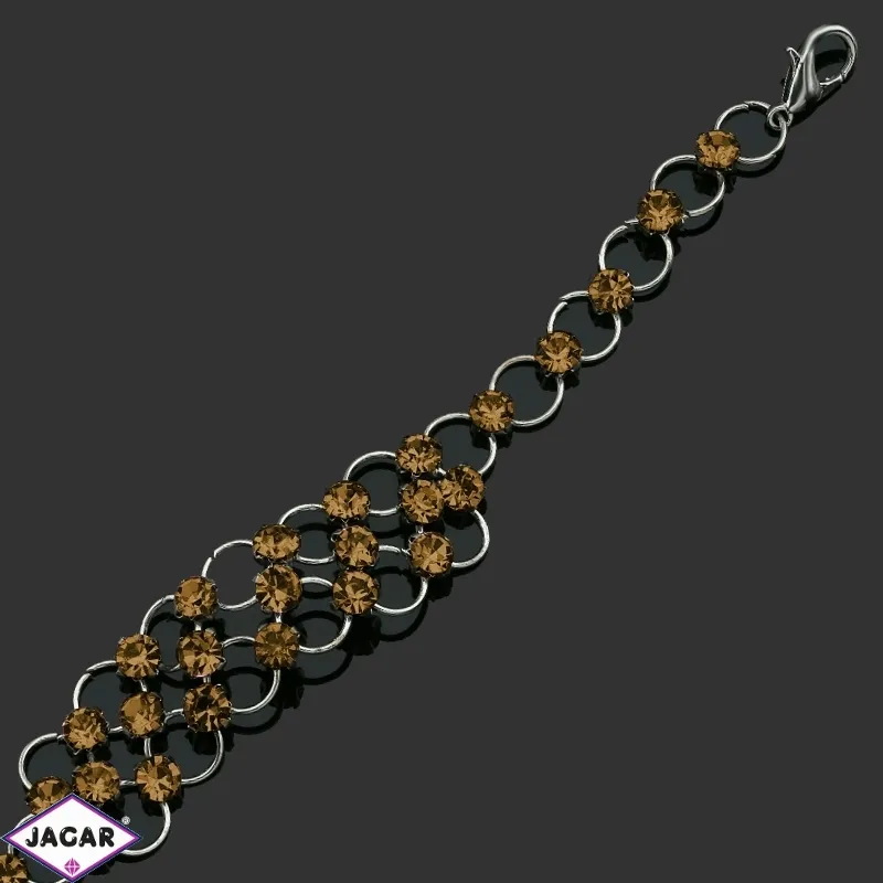 Bransoletka z kryształami -dł:21cm BRA560 amber Bransoletka z kryształami -dł:21cm BRA560 amber